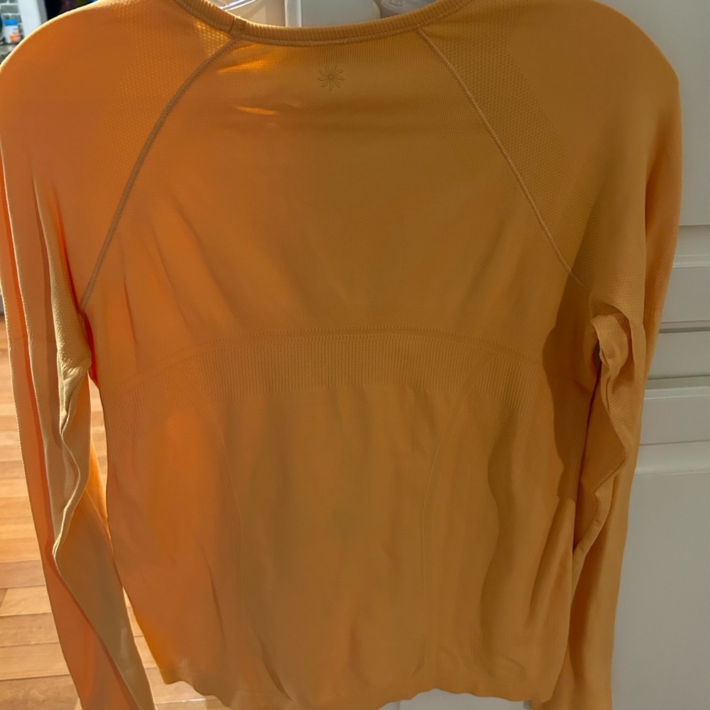 Athleta Girl Orange Fitted Long Sleeve shirt